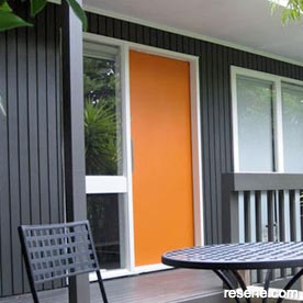 Orange and white home entrance