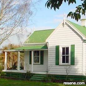 Green and white home exterior