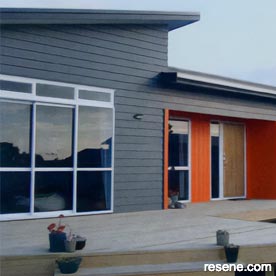 Charcoal and red home exterior