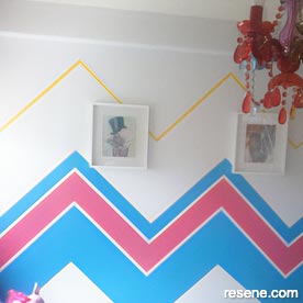 Pink and blue chevron pattern in kid's room