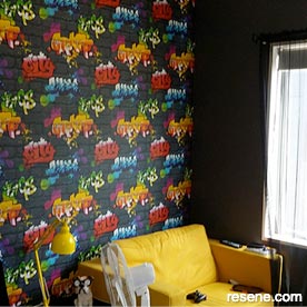 Co-ordinated wallpaper and paint in kid's room