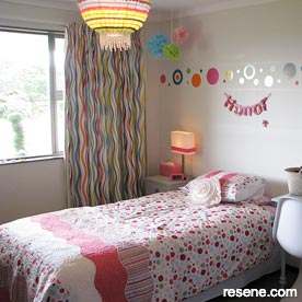 Painted stripes and spots in girl's room