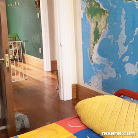 Son's room with painted worldmap