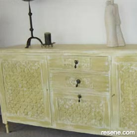 Cabinet with a distressed paint effect technique