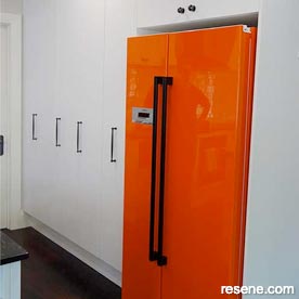 Orange and white kitchen