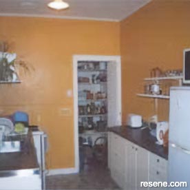 Yellow and white kitchen