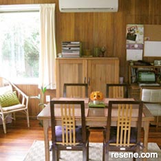 Beige, green, and orange dining room