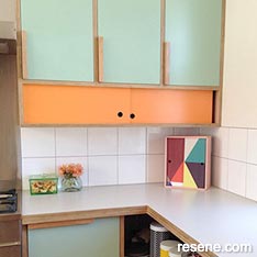 Orange and green kitchen
