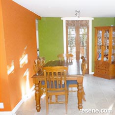 Green and orange dining room