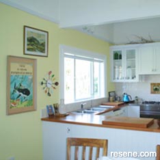 Light green and white kitchen