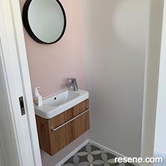 A pink and grey bathroom