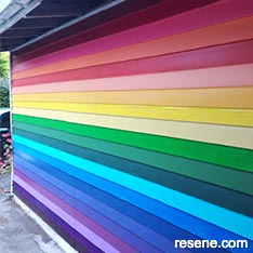 A rainbow coloured garage door
