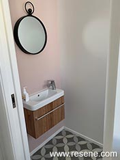 A pink and grey bathroom