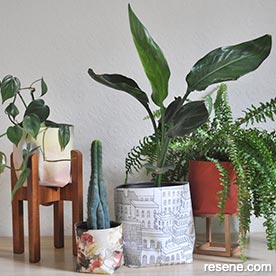 Make wallpaper plant pot covers
