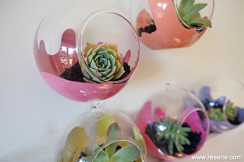 Swirl paint in terrariums for an on trend look