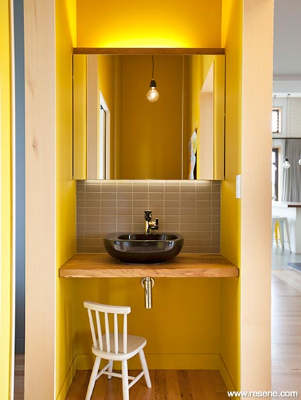 Bright yellow bathroom walls