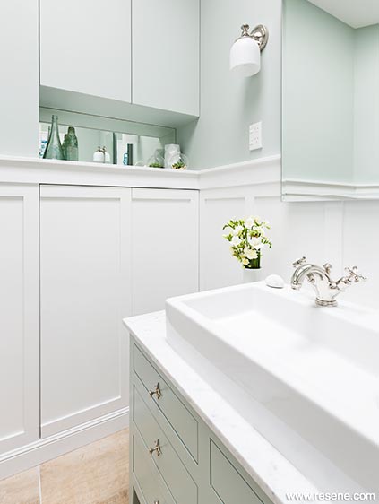 Green and white villa bathroom vanity