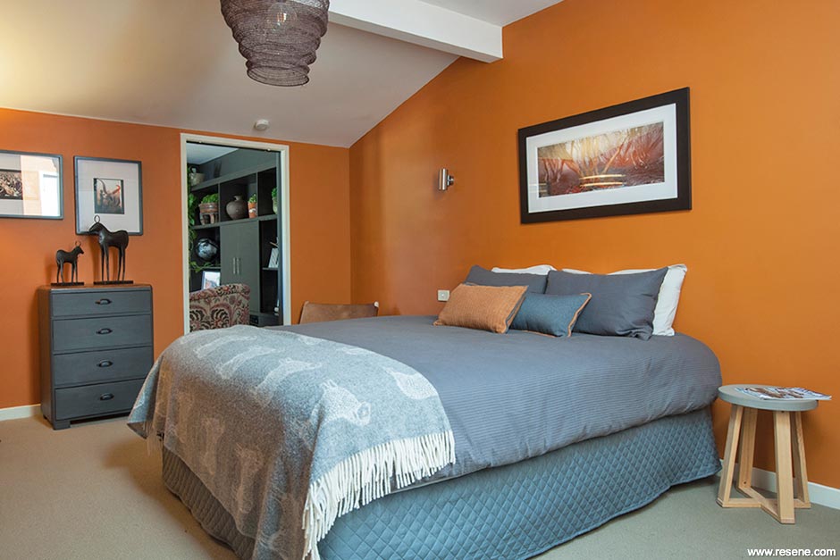 Orange and white master bedroom