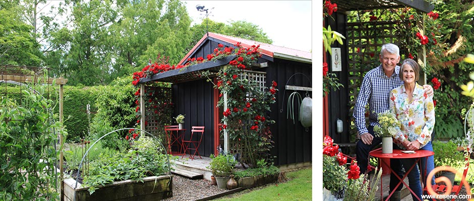 A black and red garden shed exterior