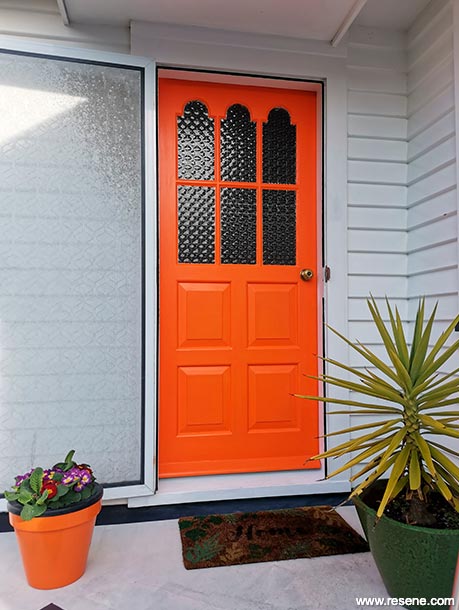 A bright orange home entryway