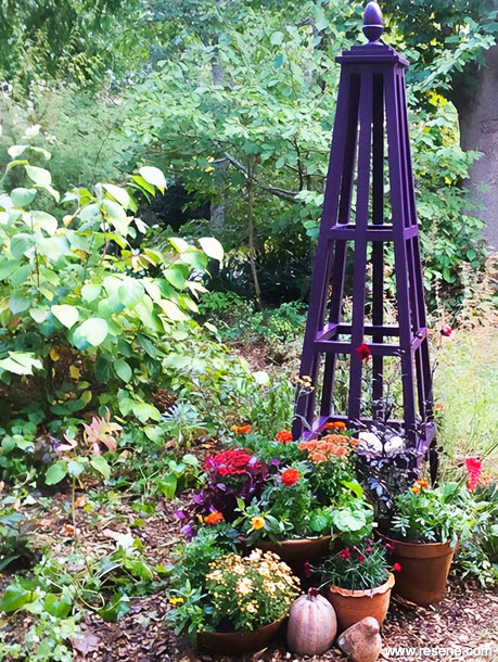 A purple garden obelisk