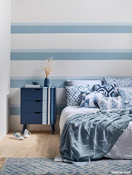 Bedroom with blue and white stripes