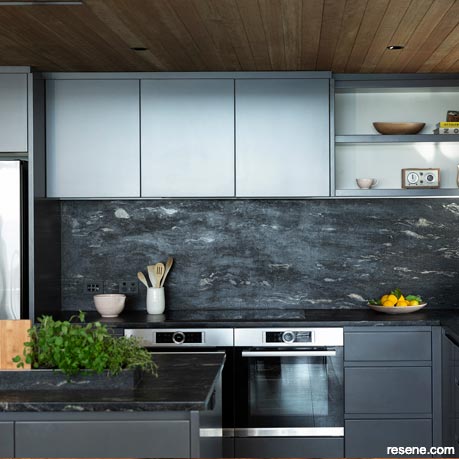 A modern dark grey kitchen