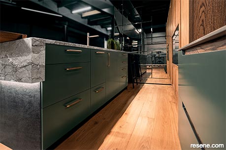 A sophisticated dark green kitchen in Resene Jurassic
