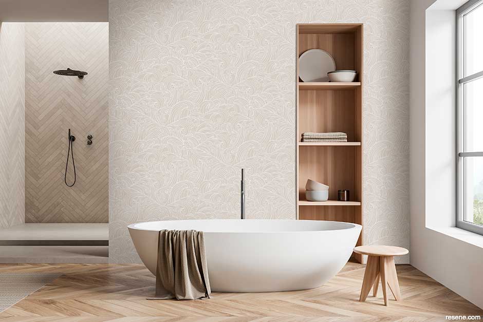 A neutral bathroom with  a twist - stylised wave design wallpaper