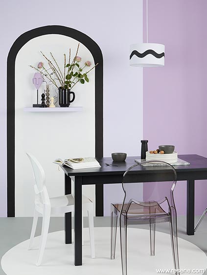 This dining room uses a sophisticated lilac, black, grey and white colour scheme