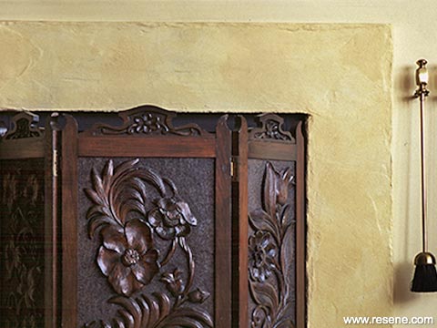 Paint a limewash effect on a fireplace