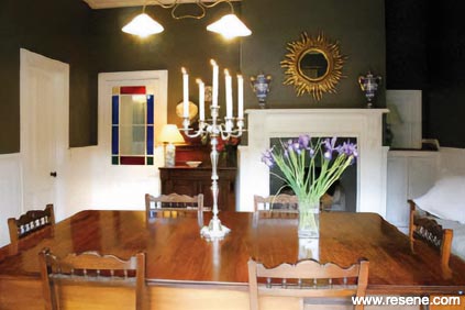 Dark green and white dining room