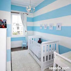 A softly striped baby's room