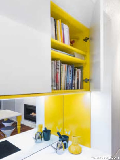 Yellow and white kitchen cupboards