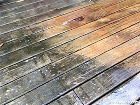 A cleaned area of a timber deck 