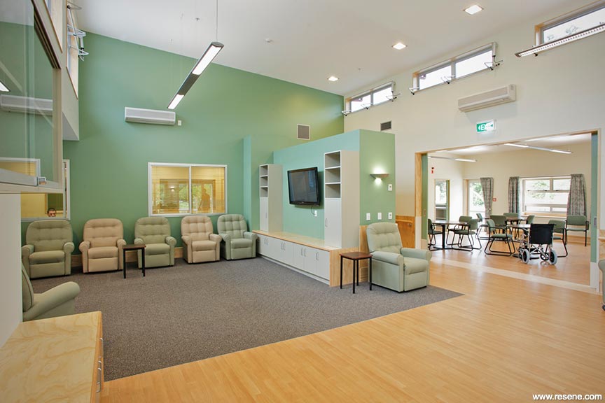Calming green and white aged care facility