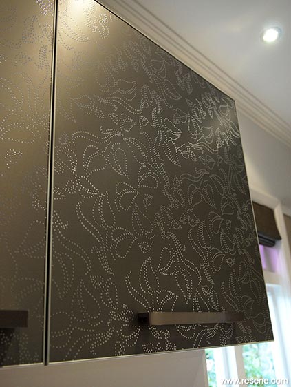 Decorated silver kitchen cupboards 2