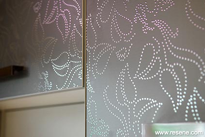 Decorated silver kitchen cupboards