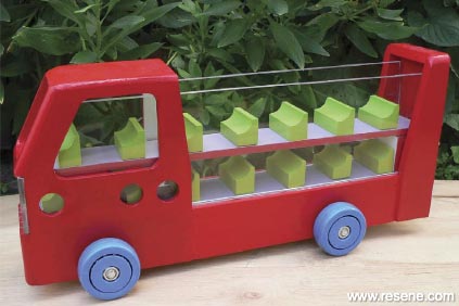 Painted wooden toy bus
