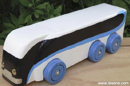 Painted wooden toy bus 2