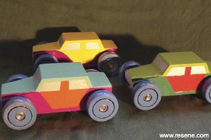 Painted wooden toy cars