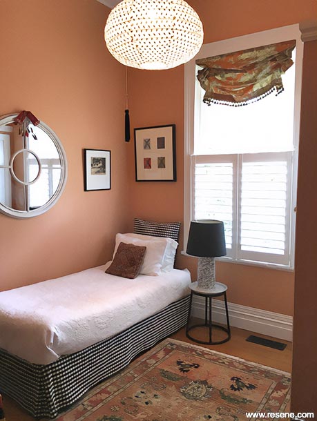 A light orange spare bedroom