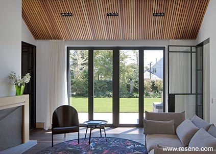 Sitting room with wooden ceiling