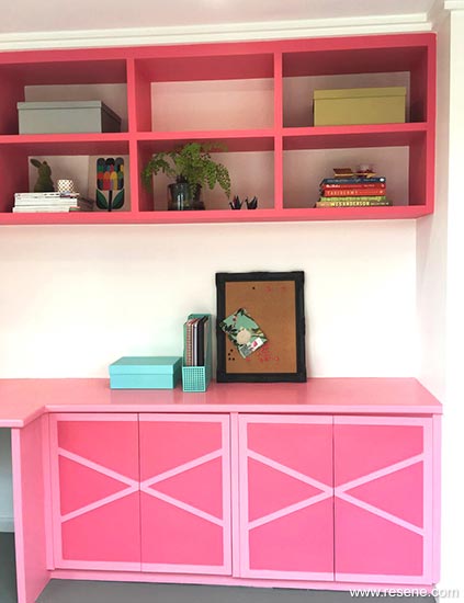Pink shelves and desk
