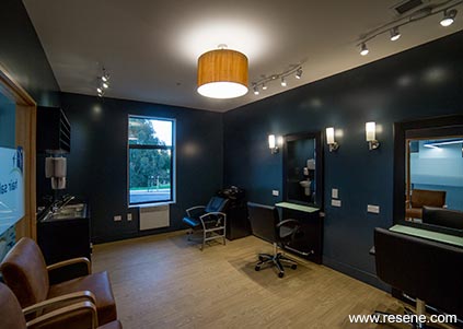 Hairdressers with navy blue walls