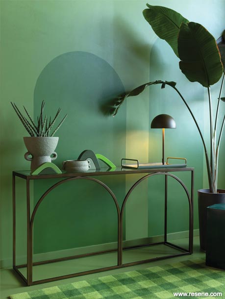 Green on green colour palette with wall mural