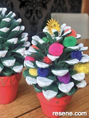 Paint pinecones and make mini Christmas trees