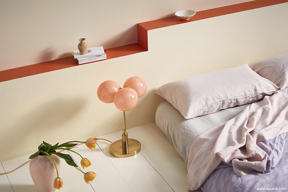 Retro bedroom in creames and orange detail stripe