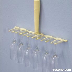 Make a wine glass holder from a rake head