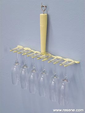 Create a wine glass holder for a wall